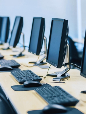 Line of desktop computers in the computer lab