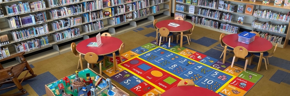 Bolden Moore location image showing the children's area with colorful mats and materials lining the walls